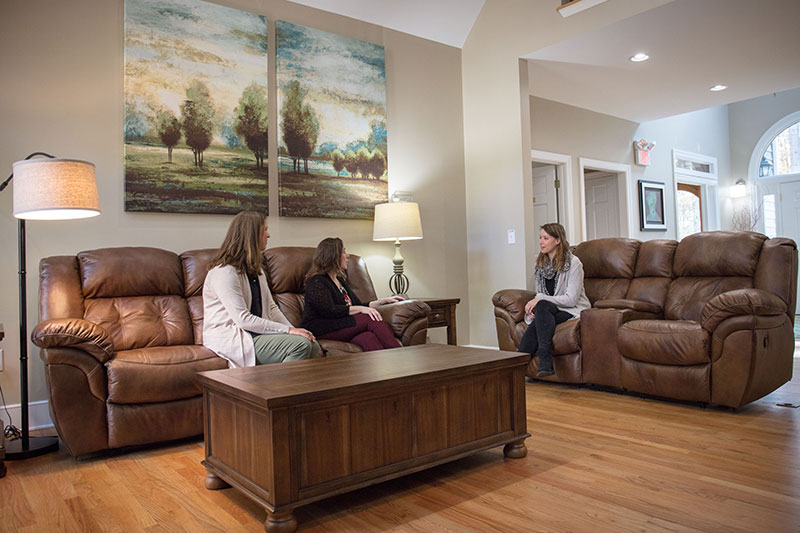 Group of women sitting in common area
