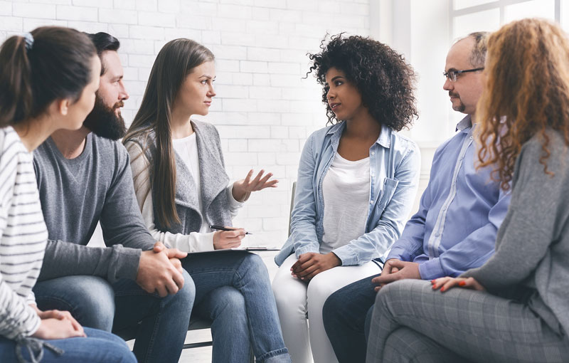 group of people in discussion